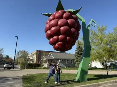 Santos family at the giant raspberry